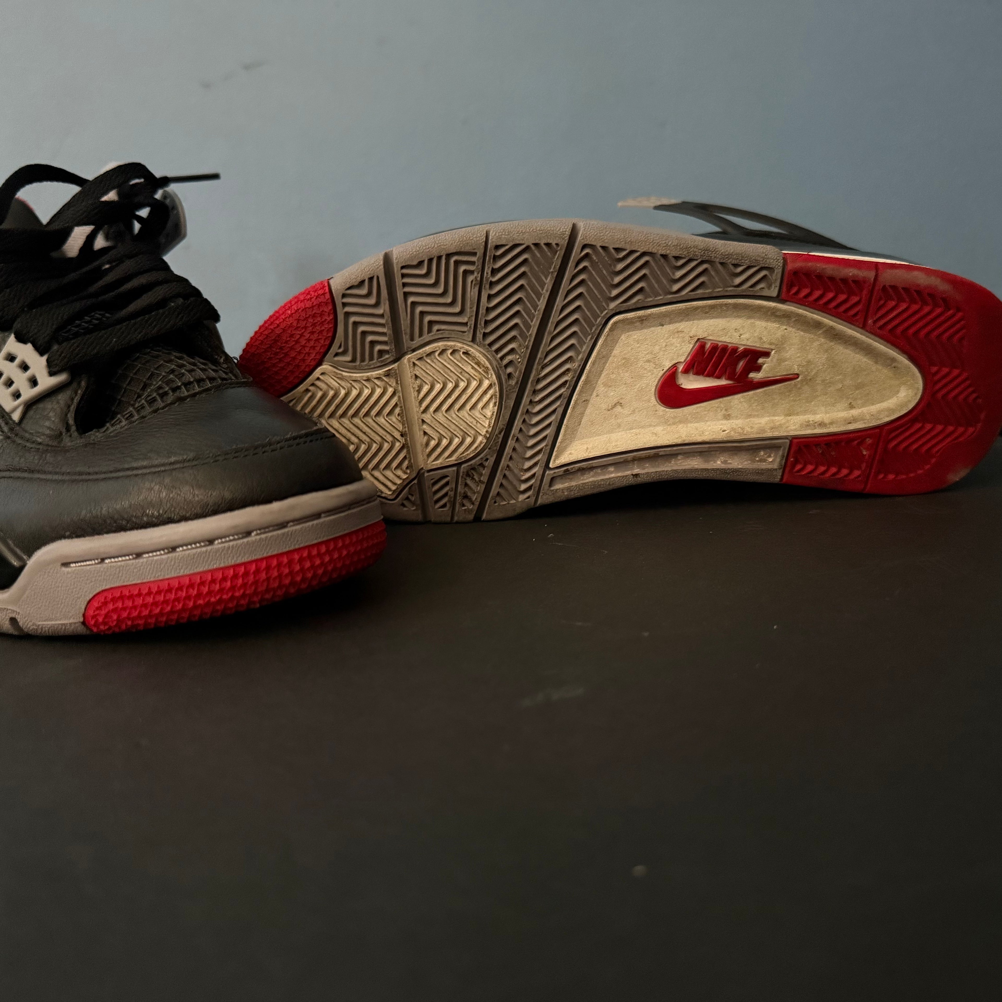 Jordan 4 bred reigiamined